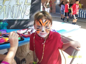 Little boy tiger face paint